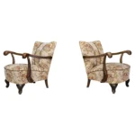 Walnut sculptural armchairs featuring their original floral upholstery, CZ 1930s